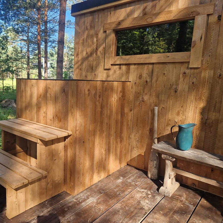 Compact outdoor sauna made with durable Thermowood finish