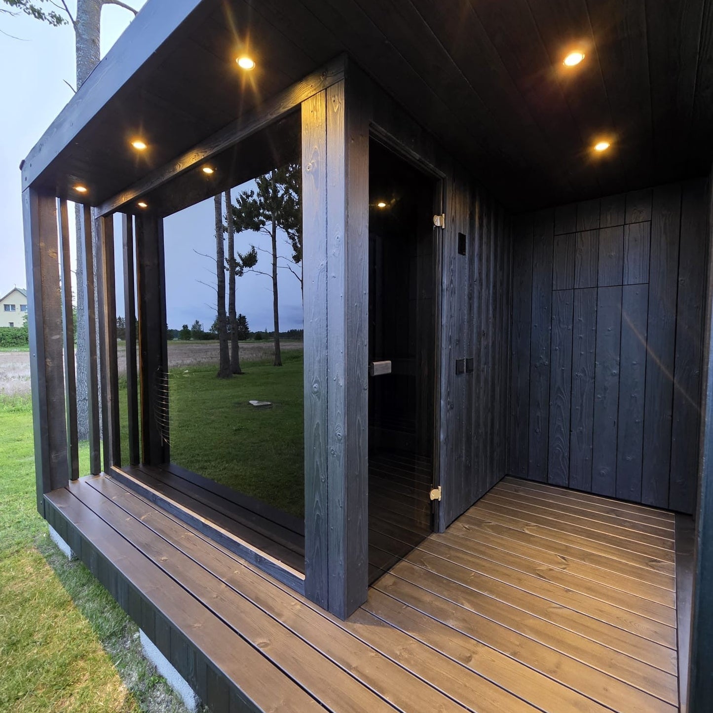 Contemporary outdoor luxury sauna with ergonomic benches and LED lighting