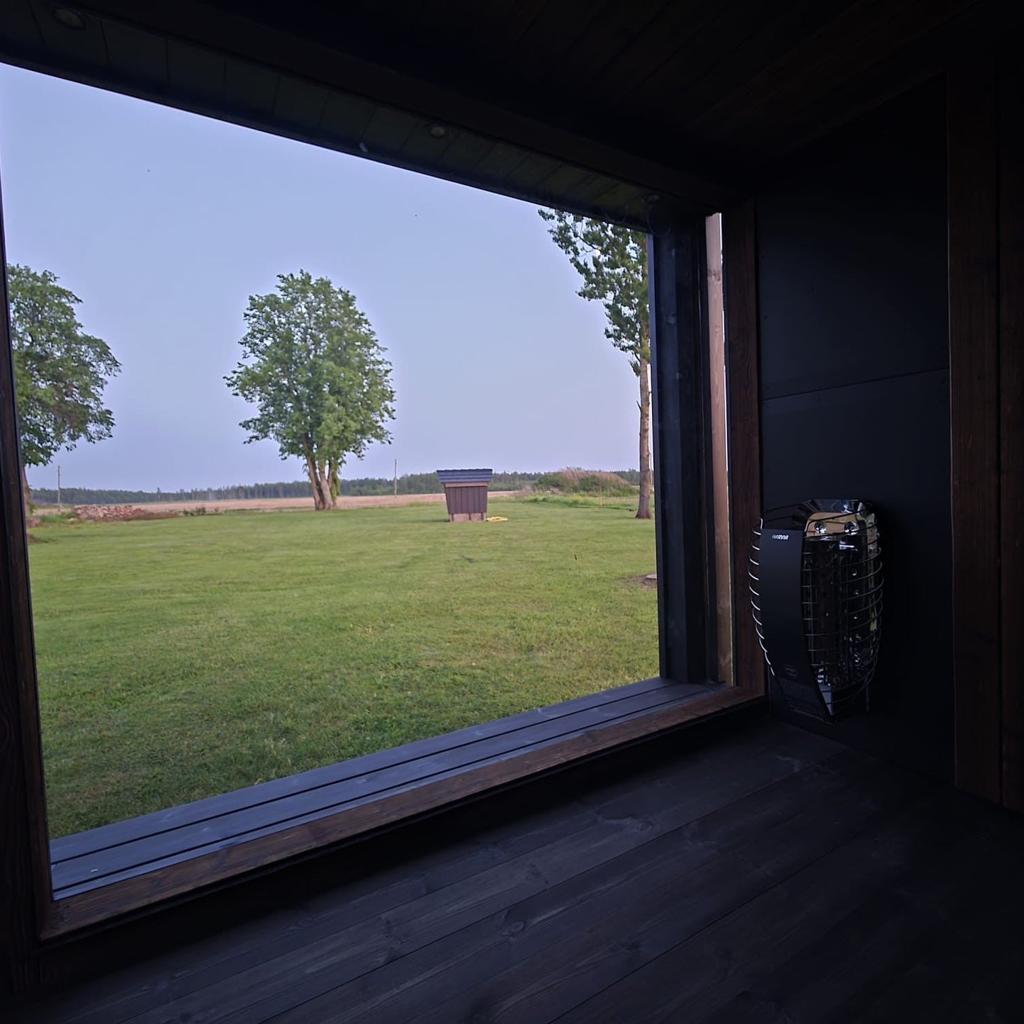 Contemporary outdoor luxury sauna with ergonomic benches and LED lighting