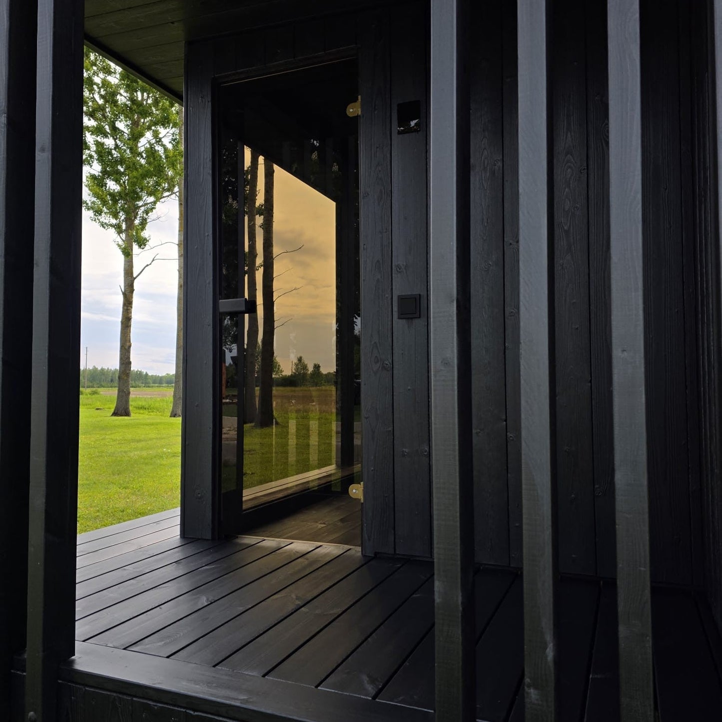 Contemporary outdoor luxury sauna with ergonomic benches and LED lighting
