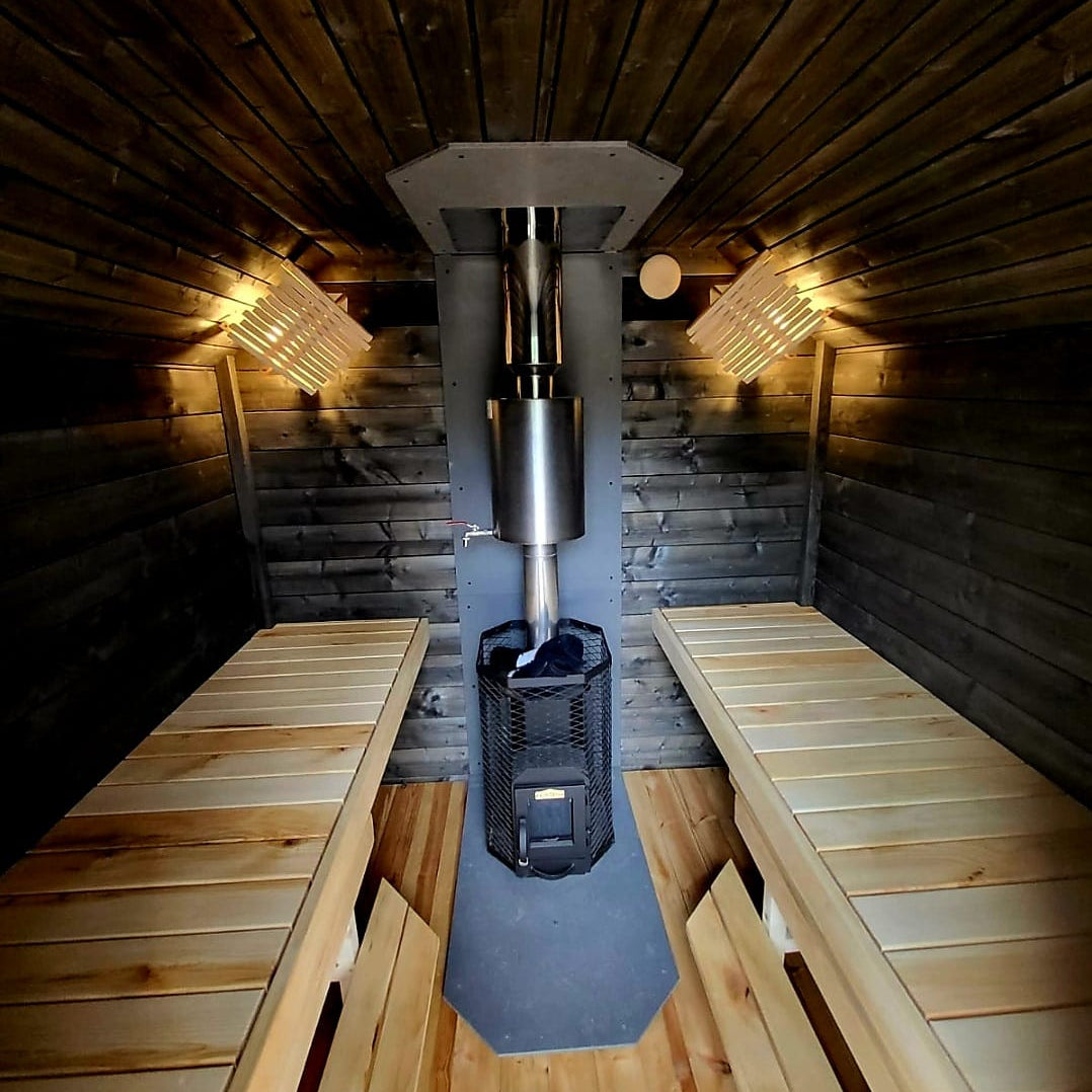 Handcrafted outdoor sauna with LED lighting and wooden benches