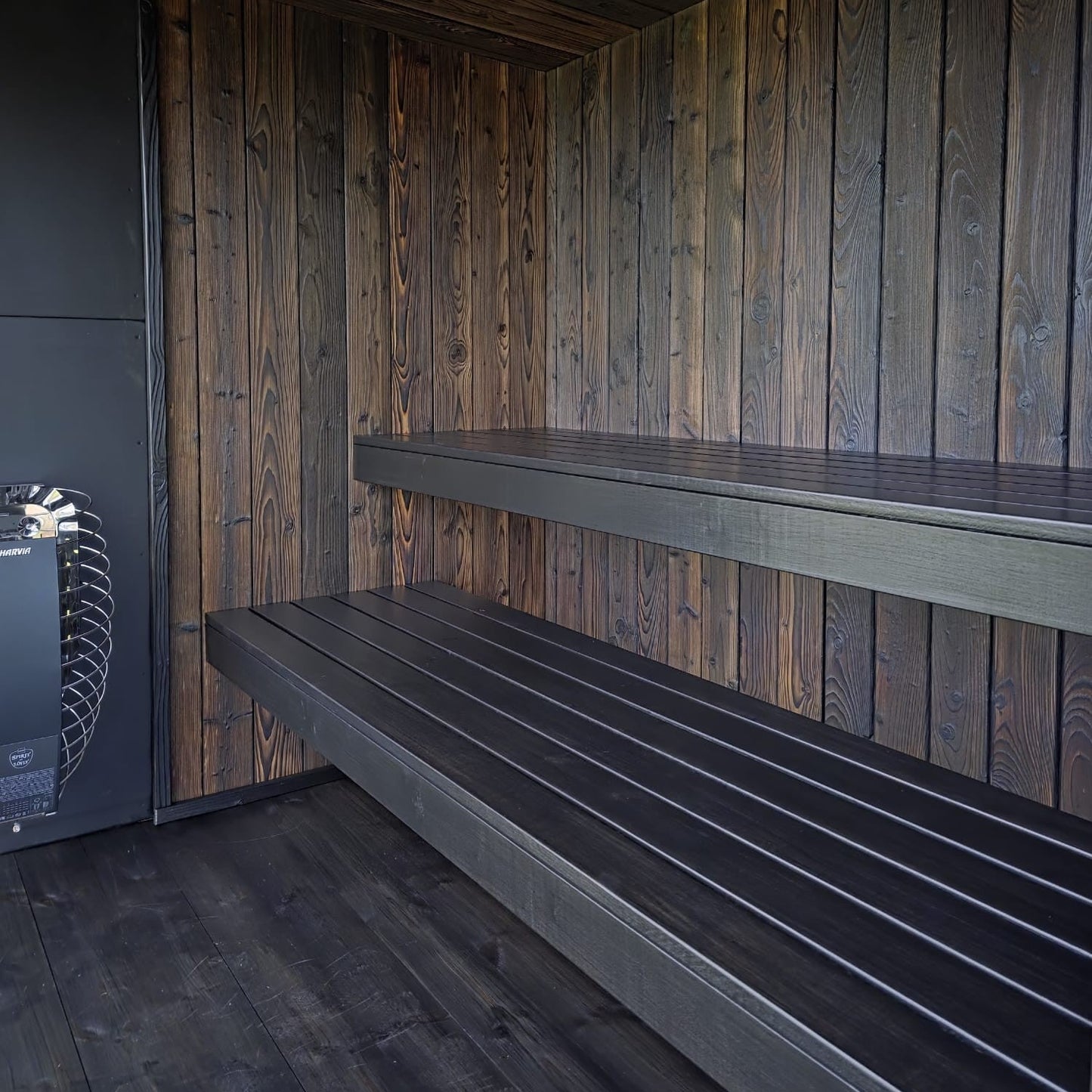 Spacious luxury sauna designed for outdoor wellness and relaxation