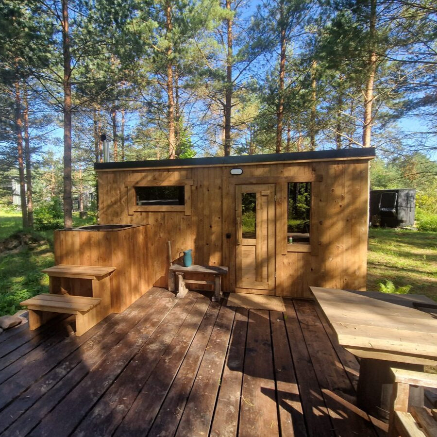 Small family-sized Thermowood outdoor sauna for wellness