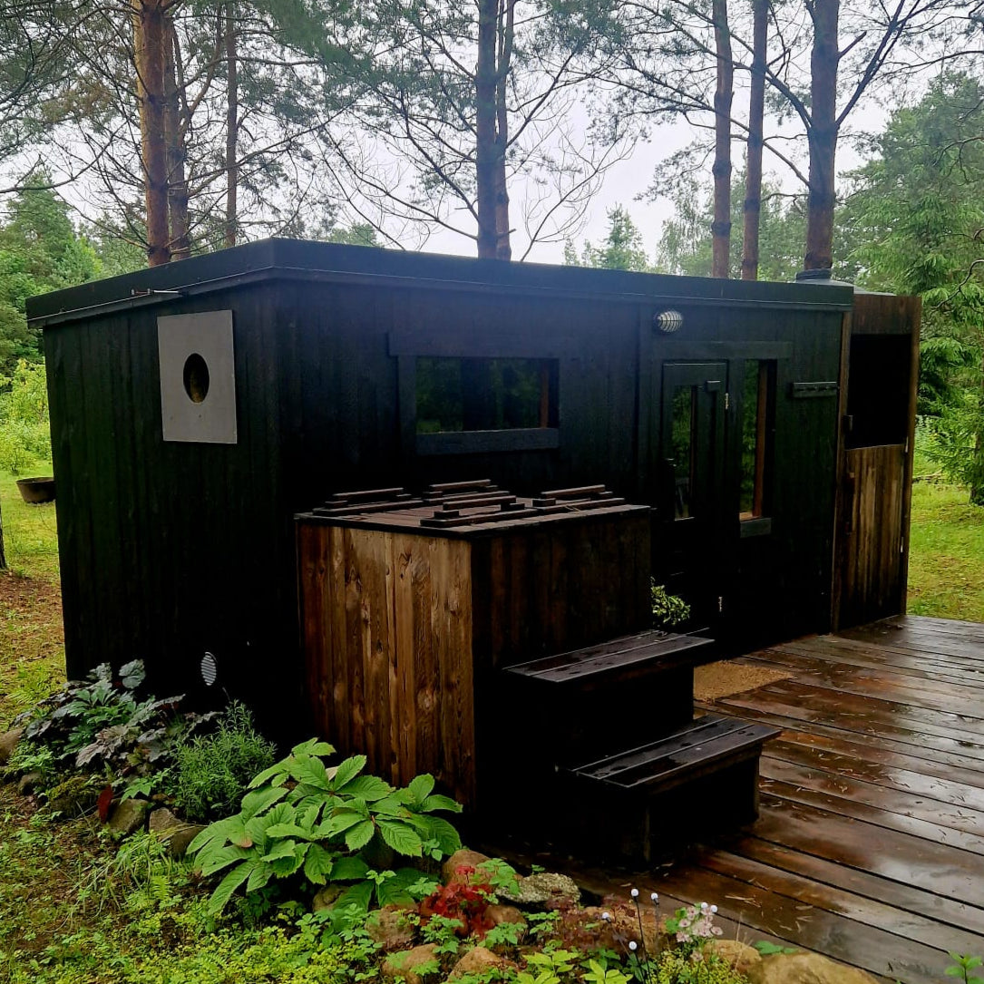 Small outdoor Thermowood sauna cabin for 4 people