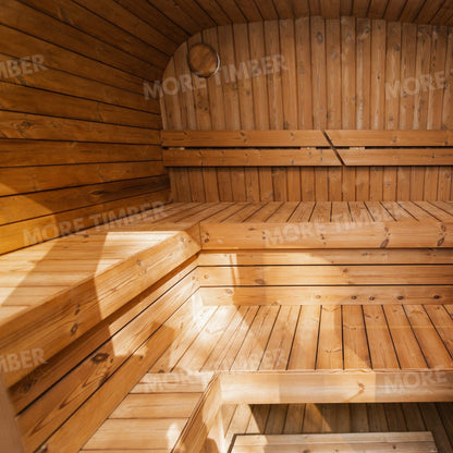 Warm wooden sauna with bucket and ladle on bench
