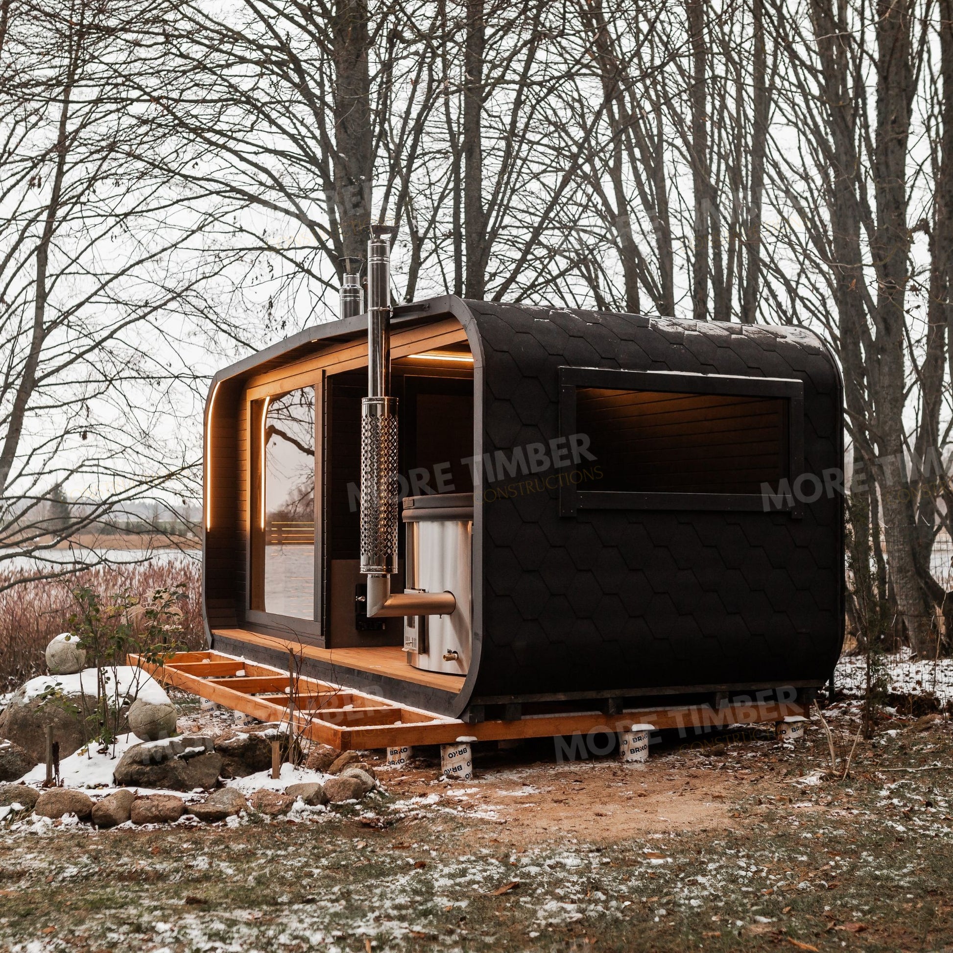 Garden spa setup with sauna and bubbling hot tub