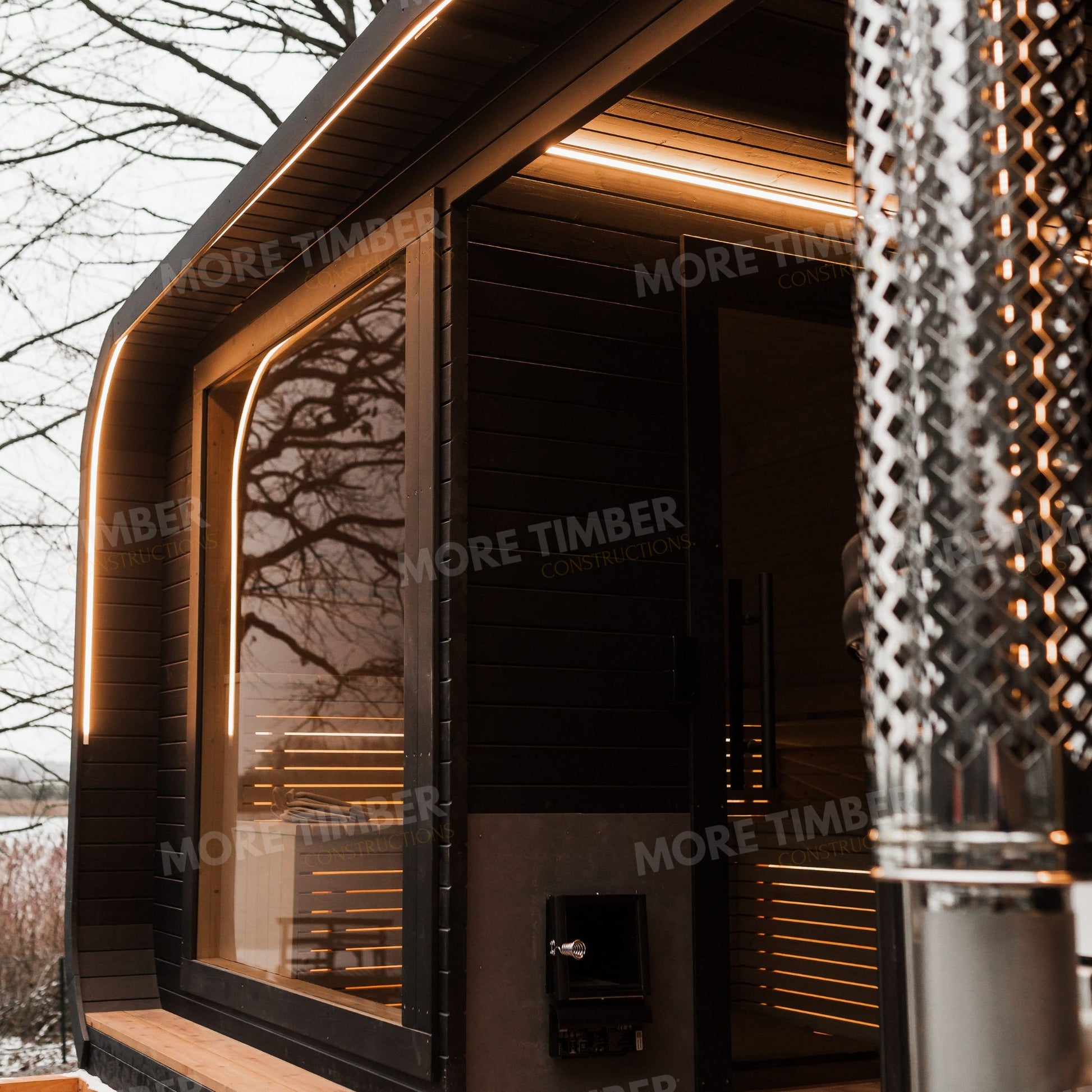 Romantic spa corner with glowing sauna and hot tub