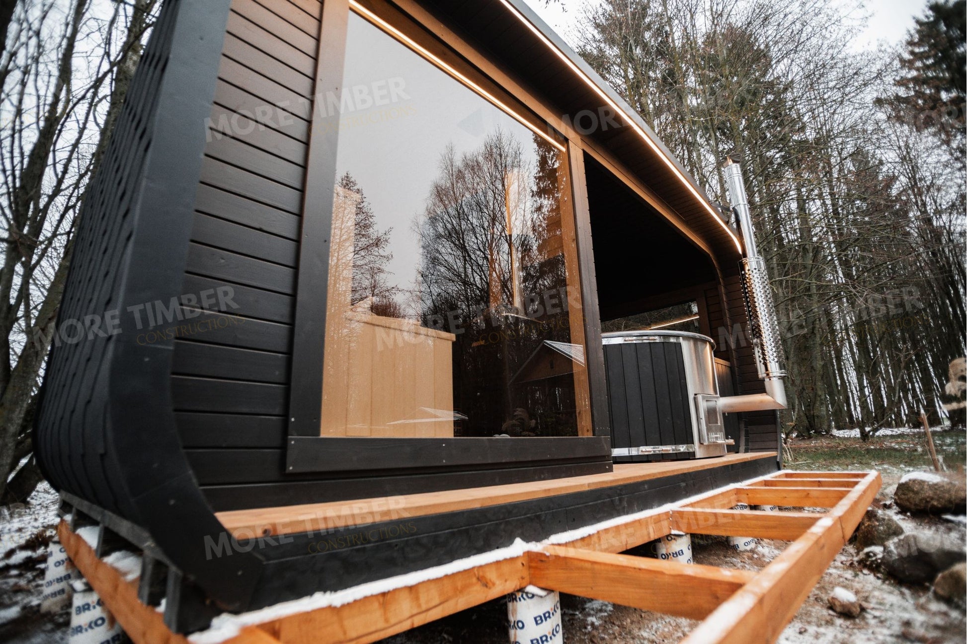 Steam clouds from hot tub and sauna in crisp winter air