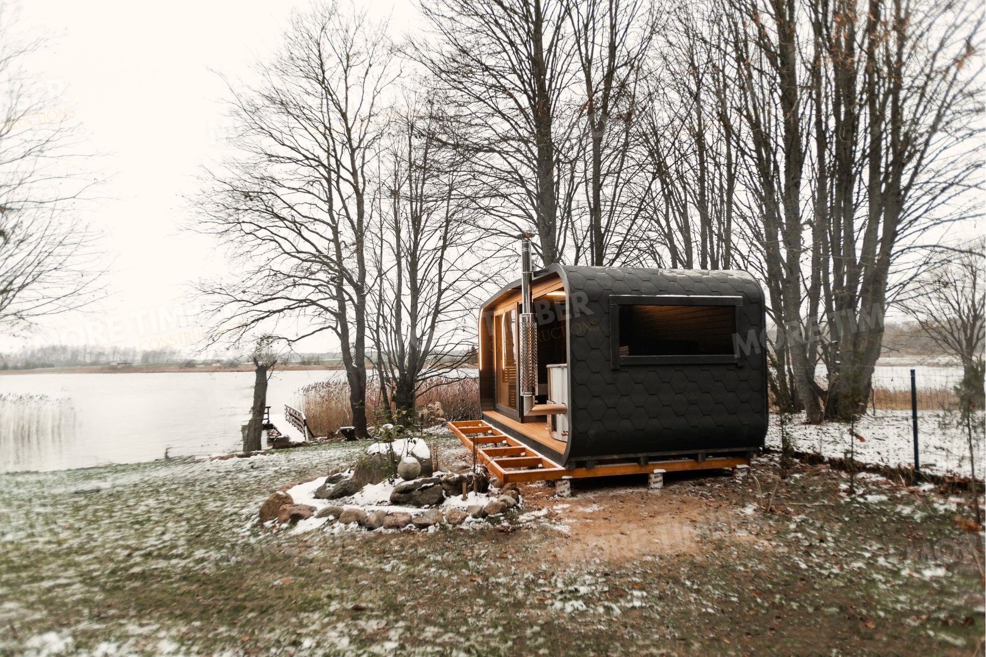 Sauna and hot tub glowing warmly on a cold evening