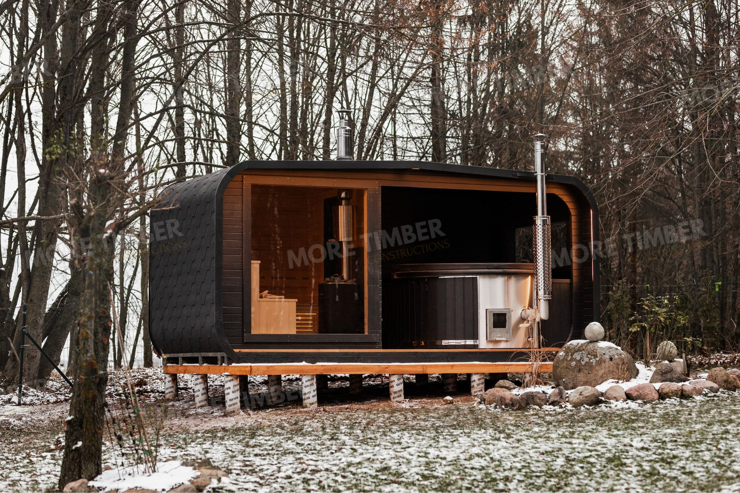 Peaceful night spa with sauna and illuminated hot tub