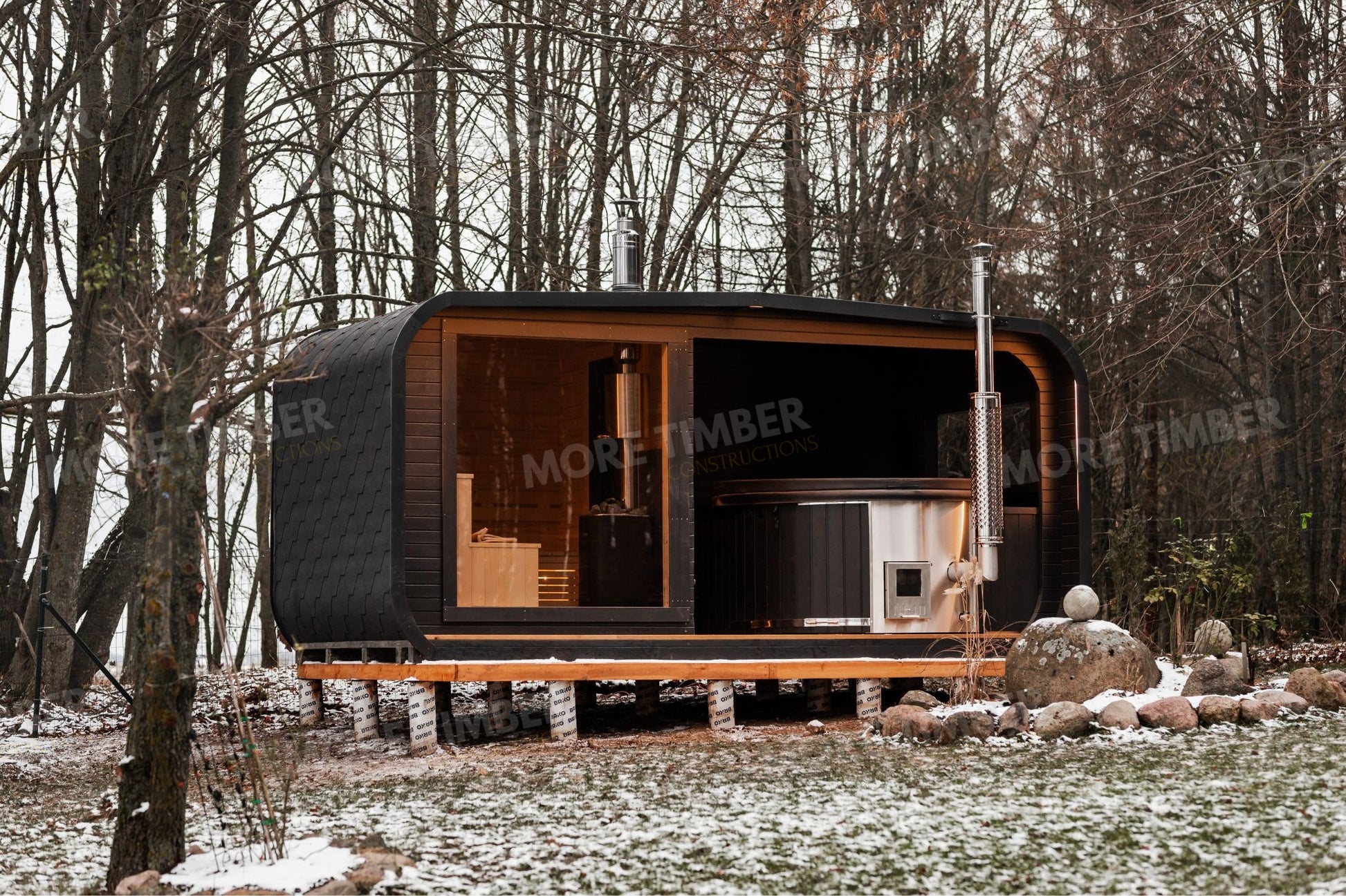 Peaceful night spa with sauna and illuminated hot tub