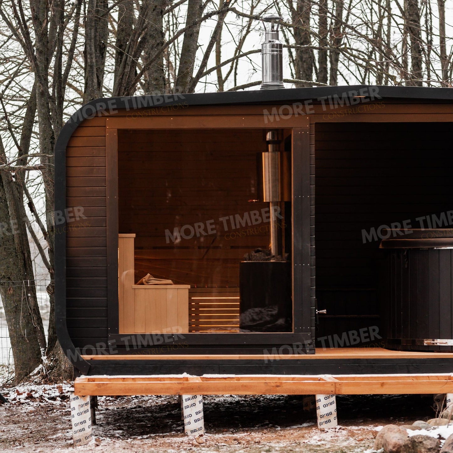 Scenic sauna and hot tub with mountain view