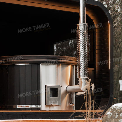 Sauna and hot tub nestled in a forest clearing