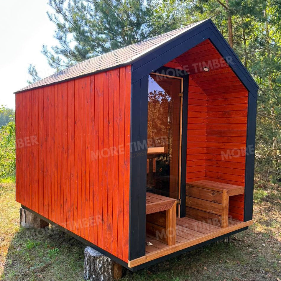 Wooden sauna with 'More Timber' branding, featuring wooden benches and a door.