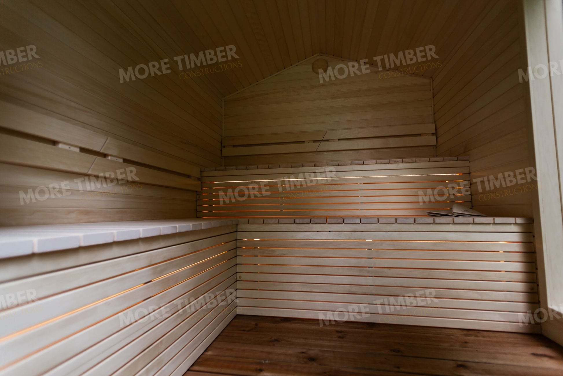 Stylish wellness retreat with traditional sauna setup