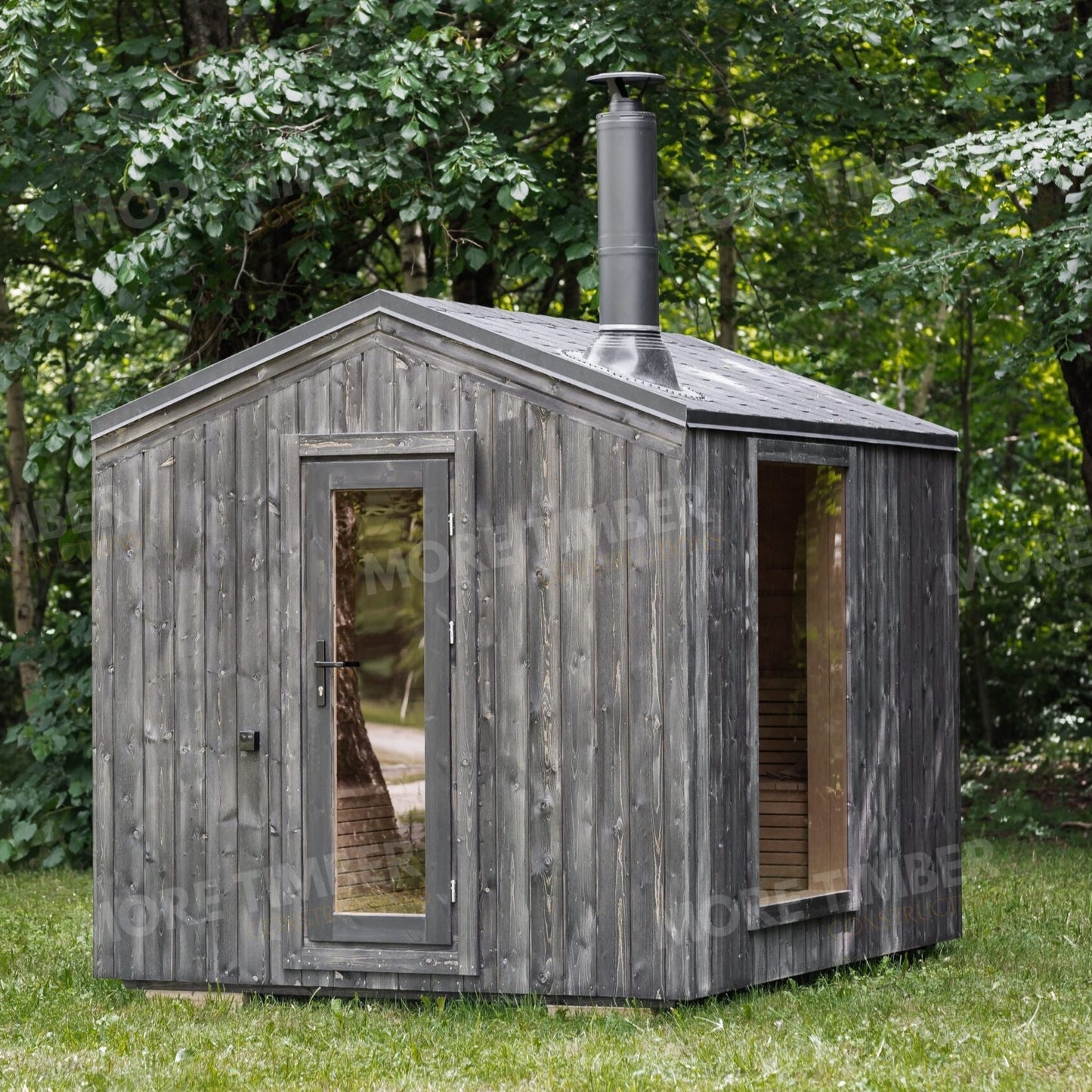 Warm wooden sauna with bucket and ladle on bench