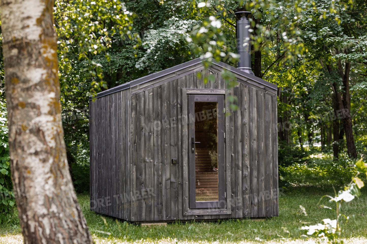Stylish wellness retreat with traditional sauna setup