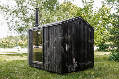 Stylish wellness retreat with traditional sauna setup