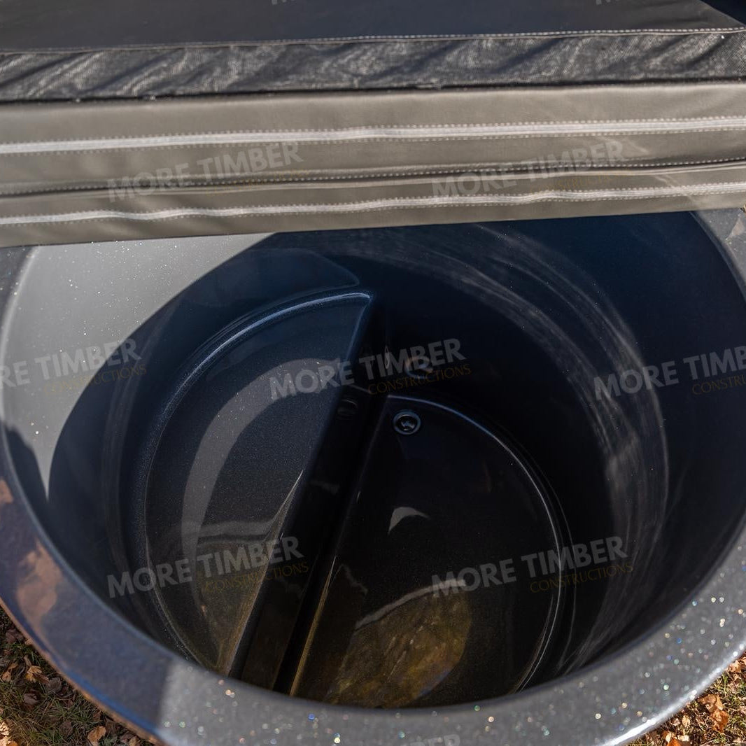 Wooden sauna with 'More Timber' branding, featuring wooden benches and a door.