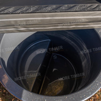 Wooden sauna with 'More Timber' branding, featuring wooden benches and a door.