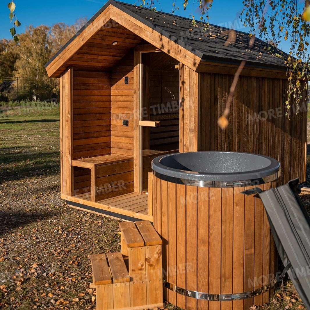 Wooden sauna with 'More Timber' branding, featuring wooden benches and a door.