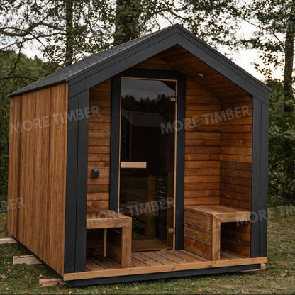 Wooden sauna with 'More Timber' branding, featuring wooden benches and a door.