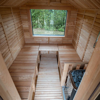 Wooden sauna with 'More Timber' branding, featuring wooden benches and a door.