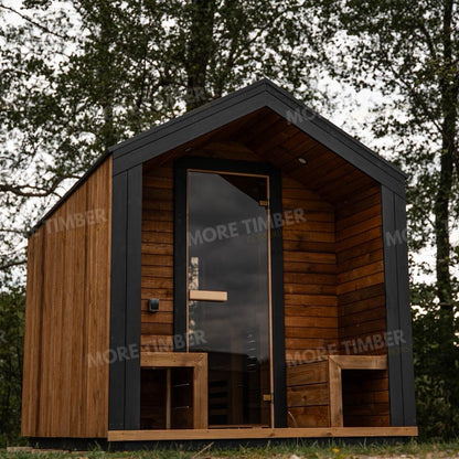 Wooden sauna with 'More Timber' branding, featuring wooden benches and a door.
