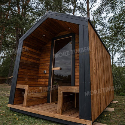 Wooden sauna with 'More Timber' branding, featuring wooden benches and a door.