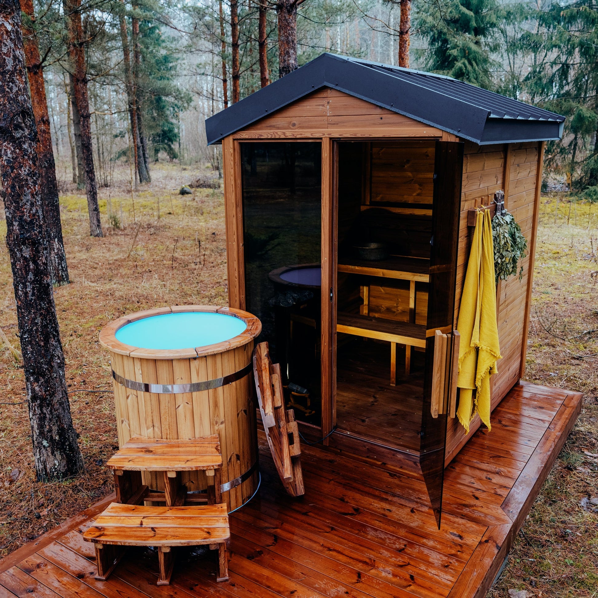 Handcrafted round cold plunge tub with Thermowood cladding