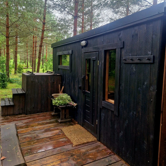 Compact Thermowood outdoor sauna designed for up to 4 persons
