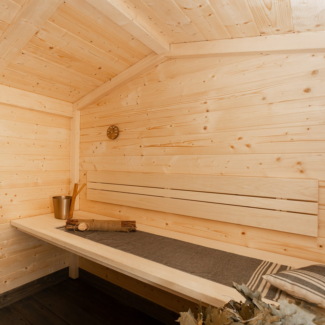 Traditional wooden sauna with benches, ideal for gardens and home use