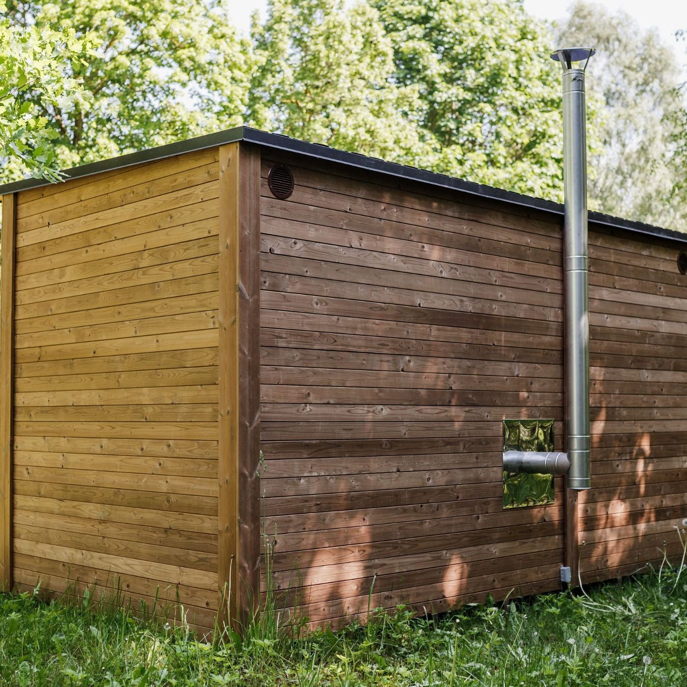 Durable terrace board flooring inside the handcrafted sauna